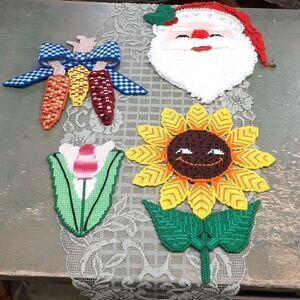 4 pc vintage 4 season plastic canvas flowers, colored corn, and Santa
